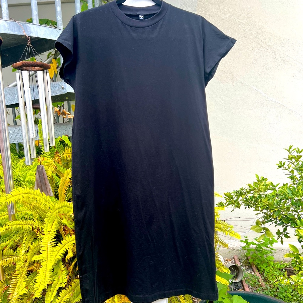 Black tee shirt dress. Worn once. Cotton, boxy cut. Cap sleeve
